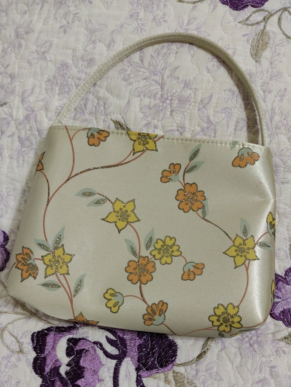 Elegant Cream Floral Shoulder Bag with Yellow & Orange Accents